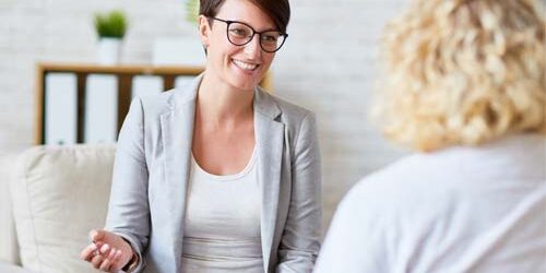 female psychiatrist speaking with patient